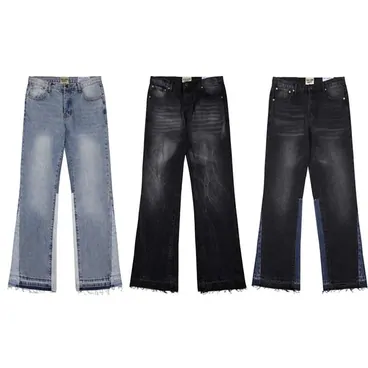 Three pairs of flared women's jeans in light, black and dark wash